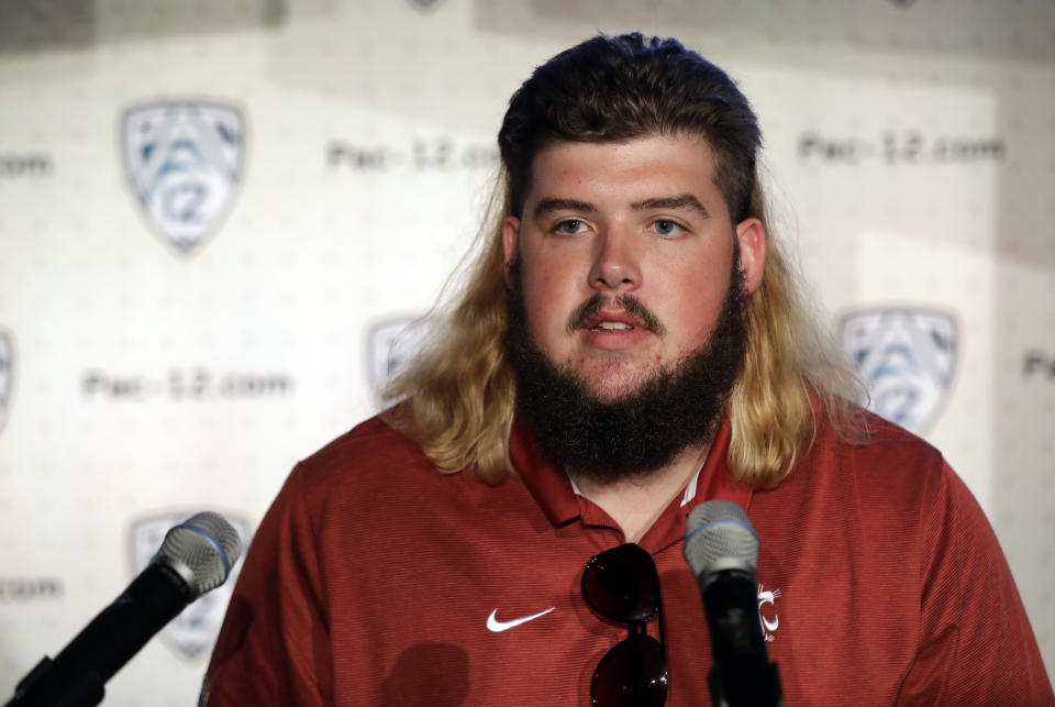 Washington State offensive lineman Liam Ryan answers question during the Pac-12 Conference NCAA college football Media Day Wednesday, July 24, 2019, in Los Angeles. (AP Photo/Marcio Jose Sanchez)