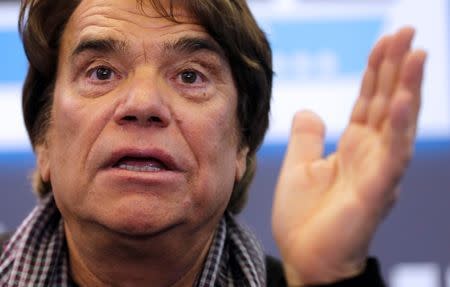 French businessman Bernard Tapie attends a news conference for the launching of his web TV at the headquarters of the French daily newspaper 'La Provence' in Marseille, March 12, 2014. REUTERS/Jean-Paul Pelissier