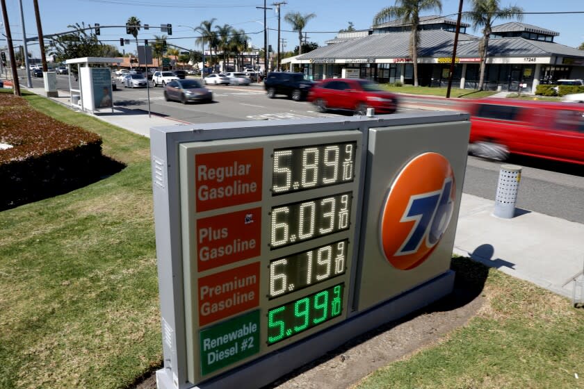 TUSTIN, CA - MARCH 08: An employee recently raised the prices of gas at the Union 76 station along 17th Street and Carroll on Tuesday, March 8, 2022 in Tustin, CA.  The average price of a gallon of self-serve regular gasoline in Los Angeles County rose 8.9 cents today, its 30th record in 32 days.  In Orange County average price rose 8.8 cents, its 29th record in 34 days.  (Gary Coronado/Los Angeles Times)