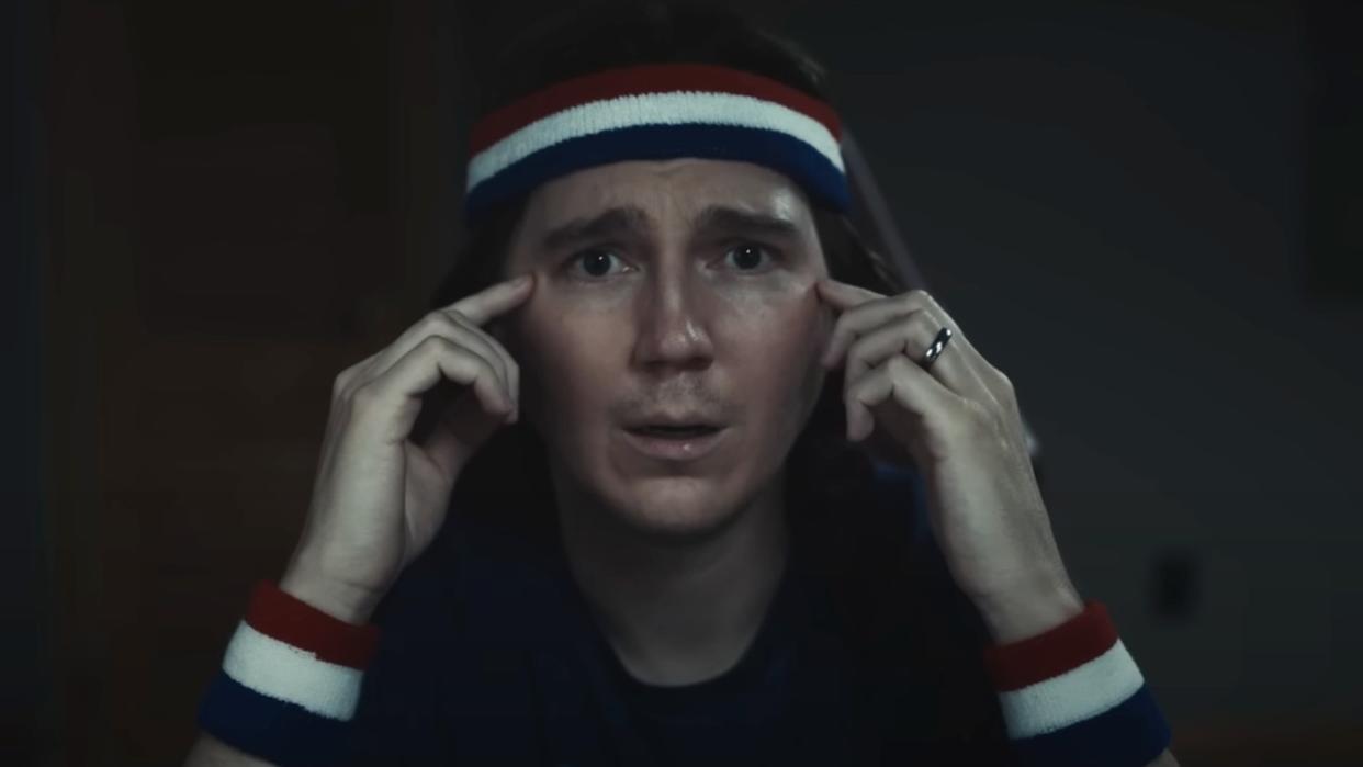  A screenshot of Paul Dano in the Dumb Money trailer looking very shocked. 