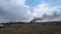 <p>A handout photo made available by the Civil Protection State Coordination (CPCE) shows the site where an Aeromexico plane crashed, in Durango, Mexico, July 31, 2018. 101 people were reported to be on board. No official casualty report has been released. (Photo: Handout/EPA-EFE/REX/Shutterstock) </p>