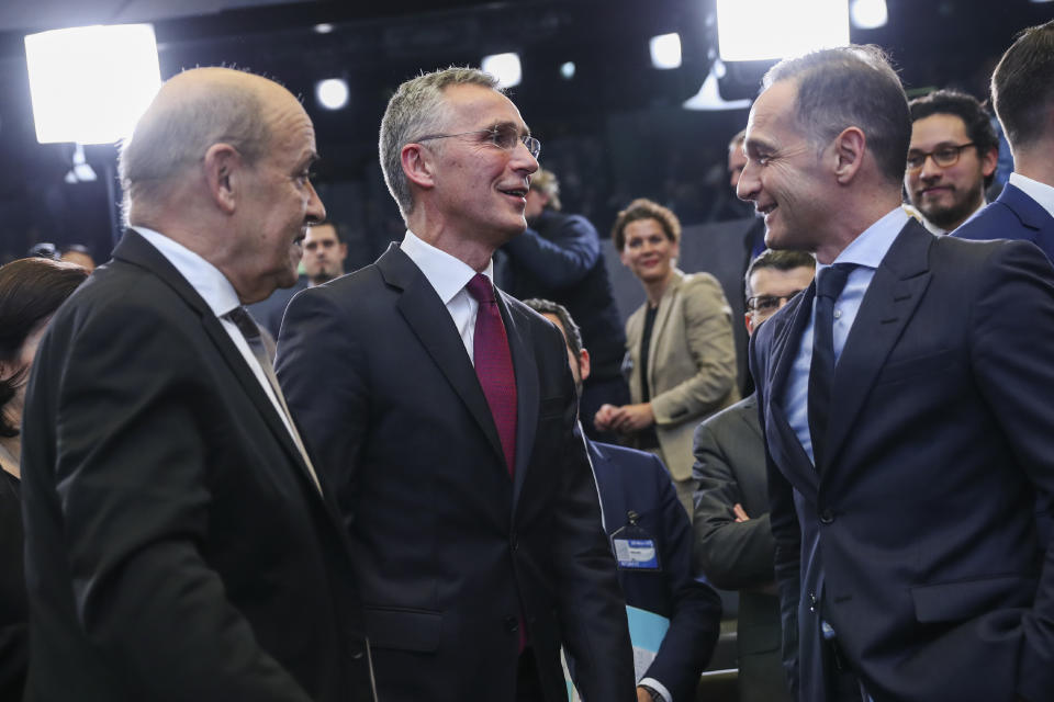 NATO Secretary General Jens Stoltenberg, center, talks to Germany's Foreign Minister Heiko Maas, right, and France's Foreign Minister Jean-Yves Le Drian during a NATO Foreign Ministers meeting at the NATO headquarters in Brussels, Wednesday, Nov. 20, 2019. (AP Photo/Francisco Seco)