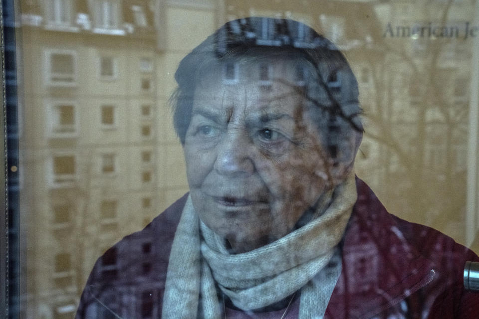 95-year-old Ruth Winkelmann, who is one of the survivors of the Holocaust, looks out of a window in Berlin, Germany, Wednesday, Jan. 17, 2024. Almost 80 years after the Holocaust, about 245,000 Jewish survivors are still living across more than 90 countries. A new report reveals that nearly half of them, or 49%, are living in Israel, 18% in Western Europe, 16% in the United States, and 12% in countries of the former Soviet Union. (AP Photo/Ebrahim Noroozi)