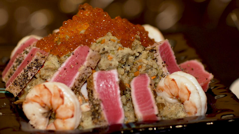 Twelve loaves of imported bread begin the Old Homestead stuffing, which also boasts Alaskan king crab, Maine lobster, Otoro tuna, and golden caviar from the Caspian Sea that costs more than $1,600 per ounce. 