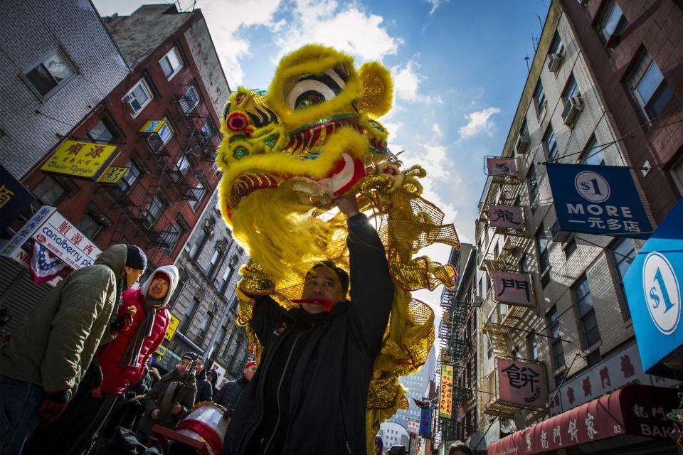 Performers present a lion dance during Chinese Lunar New Year celebrations in New York's China Town