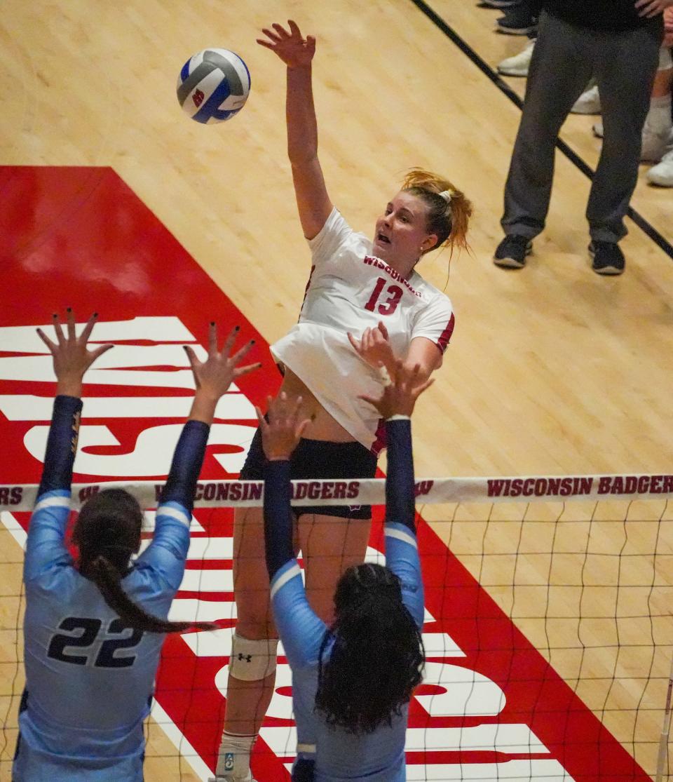 Wisconsin's Sarah Franklin spikes the ball during the season-opener match Sept. 2 against Marquette.