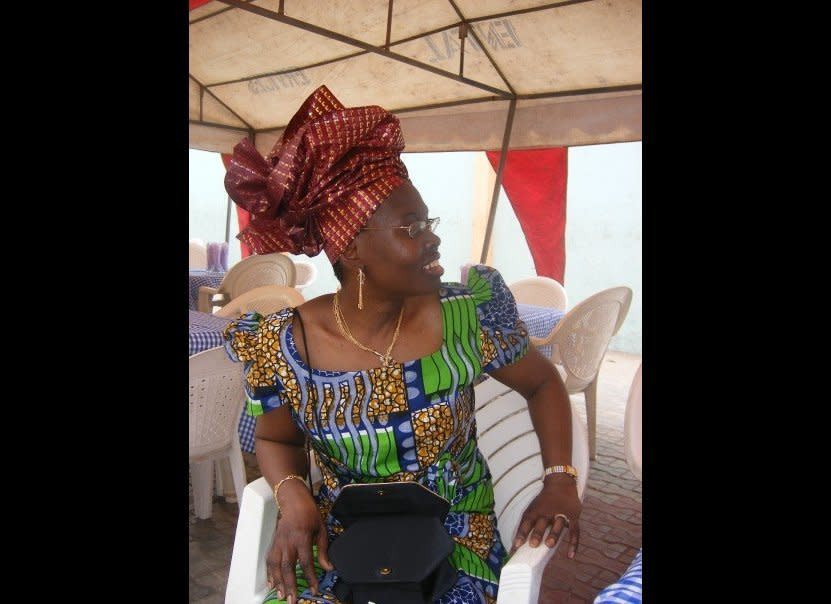 "This is a picture of my mom, Emilia Akitunde, at her mother's 80th  birthday party in Lagos, Nigeria in 2007. It was our first  mother-daughter trip; I think it marked our transition from a strictly  parent/child relationship to a genuine friendship that I really  treasure. She is the kindest, sassiest and most regal woman I know." - Anthonia Akitunde, associate editor, HuffPost 50    (HP photo)
