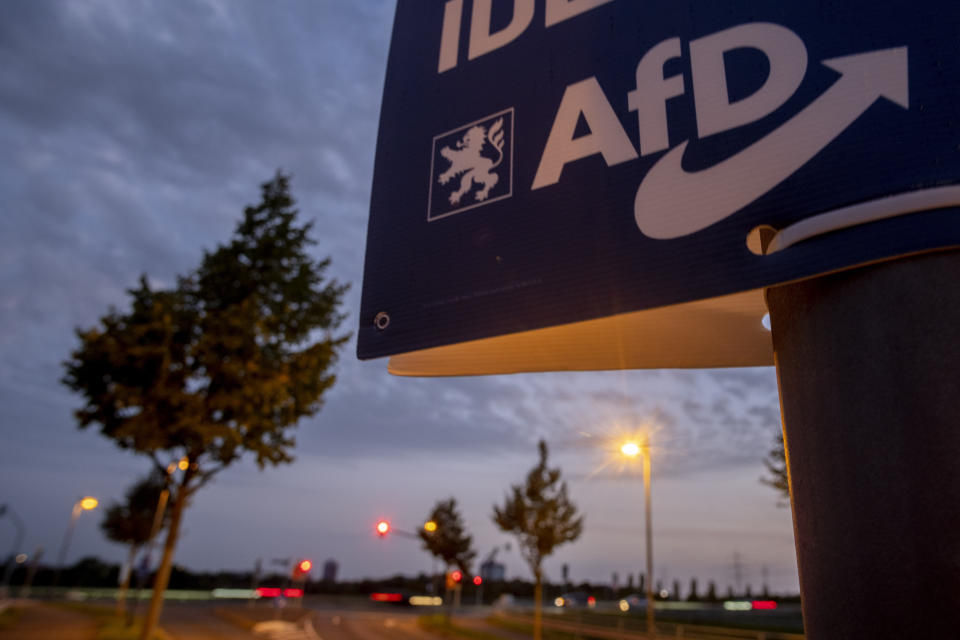 An election poster of right wing party AfD is fixed on a pole during the Hesse federal state election in Frankfurt, Germany, Sunday, Oct. 8, 2023. Hesse election were held on Sunday. (AP Photo/Michael Probst)