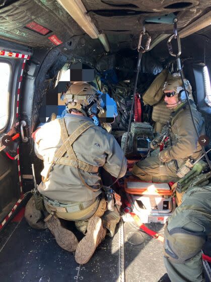 Vehicle 250 feet over the side, Monkey Canyon, Angeles Forest. Los Angeles Sheriff's Department Air Rescue 5 on scene to conduct the rescue. LASD SEB Tactical Medics deployed and hoisted 2 victims out of the canyon. Airlifted to a trauma center. Saving lives priority 1 on Dec. 13, 2022.