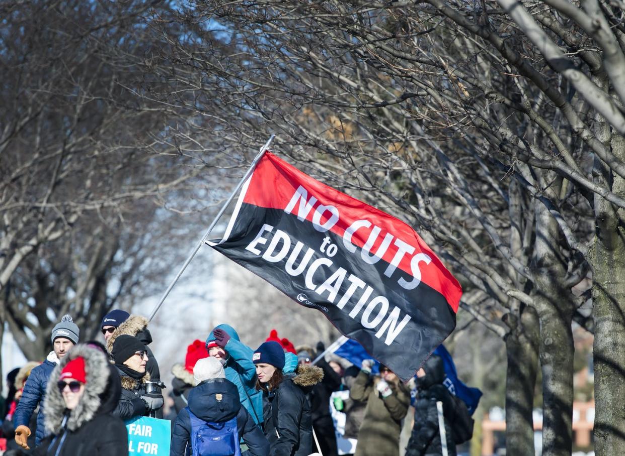 <span class="caption">Thousands of teachers from the Peel District School Board hold a one-day strike in Mississauga, Ont., in February 2020.</span> <span class="attribution"><span class="source">THE CANADIAN PRESS/Nathan Denette </span></span>