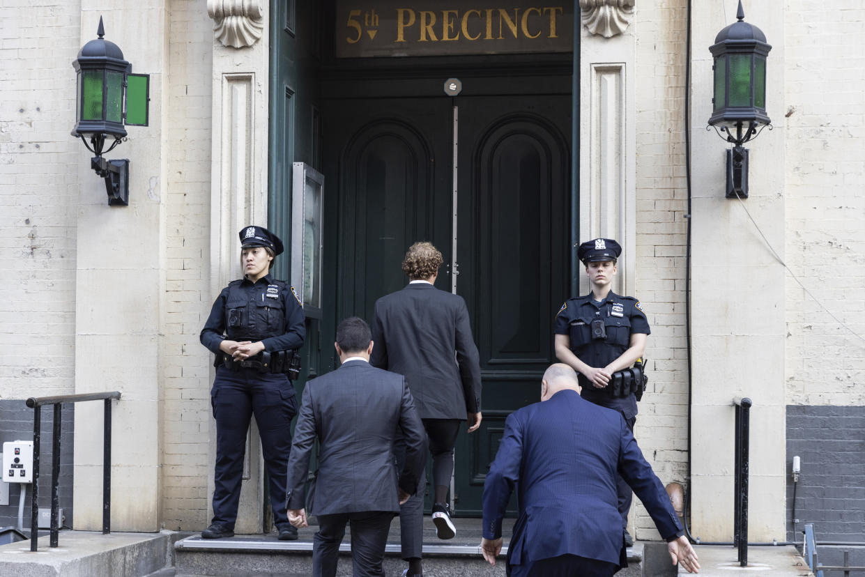 Daniel Penny arrives to surrender at the 5th Precinct on Friday, May. 12, 2023 in New York. Manhattan prosecutors announced Thursday they would bring the criminal charge against Penny, 24, a U.S. Marine Corps veteran, in the May 1 death of 30-year-old Jordan Neely. (AP Photo/Jeenah Moon)