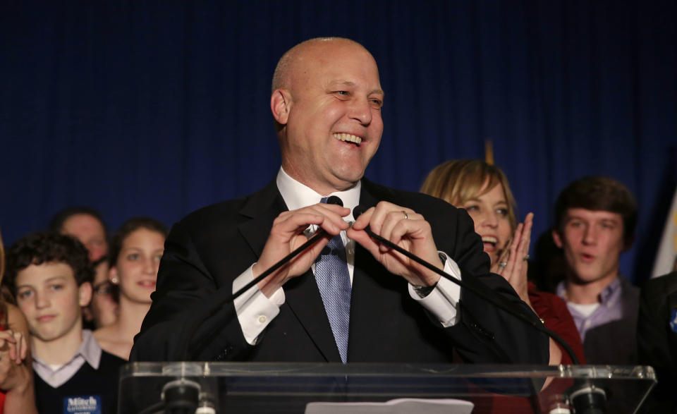 Incumbent New Orleans Mayor Mitch Landrieu addresses supporters after winning reelection in New Orleans, Saturday, Feb. 1, 2014. (AP Photo/Gerald Herbert)