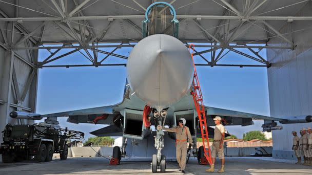 PHOTO: In this file photo taken on September 26, 2019, a Russian air force Sukhoi Su-35 fighter jet is prepared for take off at the Russian military base of Hmeimim, in Syria's Latakia governorate. (Maxime Popov/AFP via Getty Images)