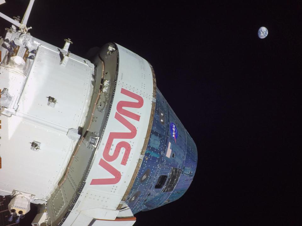 During the Artemis I mission flight day 11, NASA’S Orion spacecraft captured imagery looking back at the Earth from a camera mounted on one of its solar arrays while in a distant retrograde orbit around the Moon.