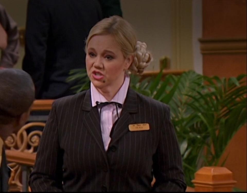 Caroline Rhea dressed as a hotel inspector