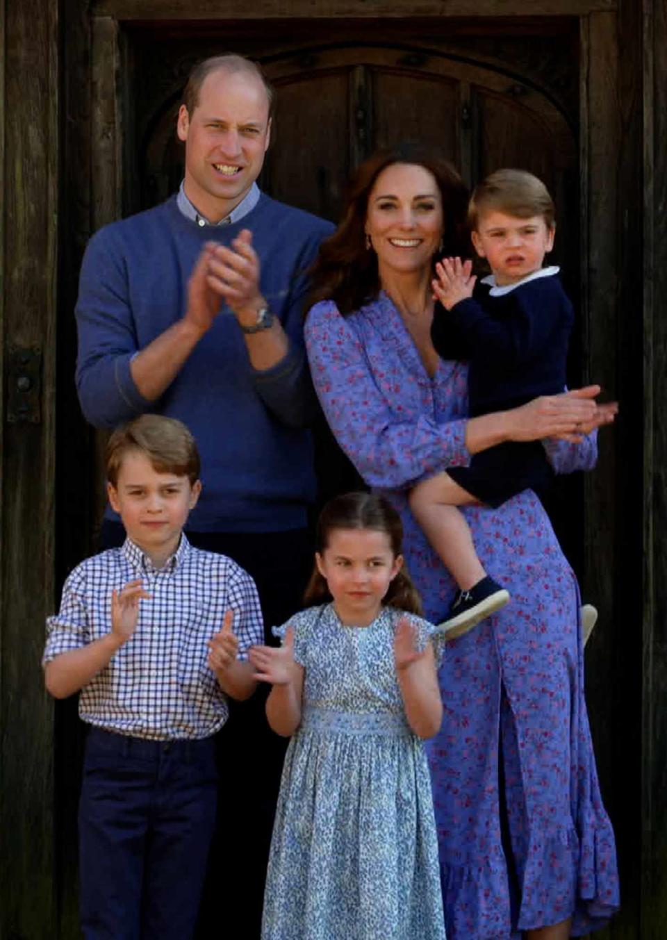 In this screengrab, Prince William, Duke of Cambridge, Catherine Duchess of Cambridge, Prince George of Cambridge, Princess Charlotte of Cambridge and Prince Louis of Cambridge clap for NHS carers as part of the BBC Children In Need and Comic Relief 'Big Night In at London on April 23, 2020 in London, England.The 'Big Night In' brings the nation an evening of unforgettable entertainment in a way we've never seen before. Raising money for and paying tribute to those on the front line fighting Covid-19 and all the unsung heroes supporting their communities