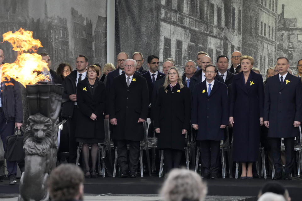 Front from right, Polish President Andrzej Duda, Agata Kornhauser-Duda, Israel's President Isaac Herzog, Michal Herzog, German President Frank-Walter Steinmeier and Elke Buedenbender attend a 'Warsaw Ghetto Uprising' commemoration reception in Warsaw, Poland, Wednesday, April 19, 2023. Presidents and Holocaust survivors and their descendants are marking the 80th anniversary of the Warsaw Ghetto Uprising. The anniversary honors the hundreds of young Jews who took up arms in Warsaw in 1943 against the overwhelming might of the Nazi German army. (AP Photo/Czarek Sokolowski)