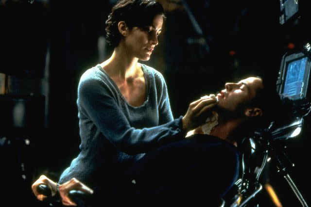 <p>Ronald Siemoneit/Sygma/Sygma/Getty</p> Carrie-Anne Moss and Keanu Reeves in 'The Matrix' (1999)