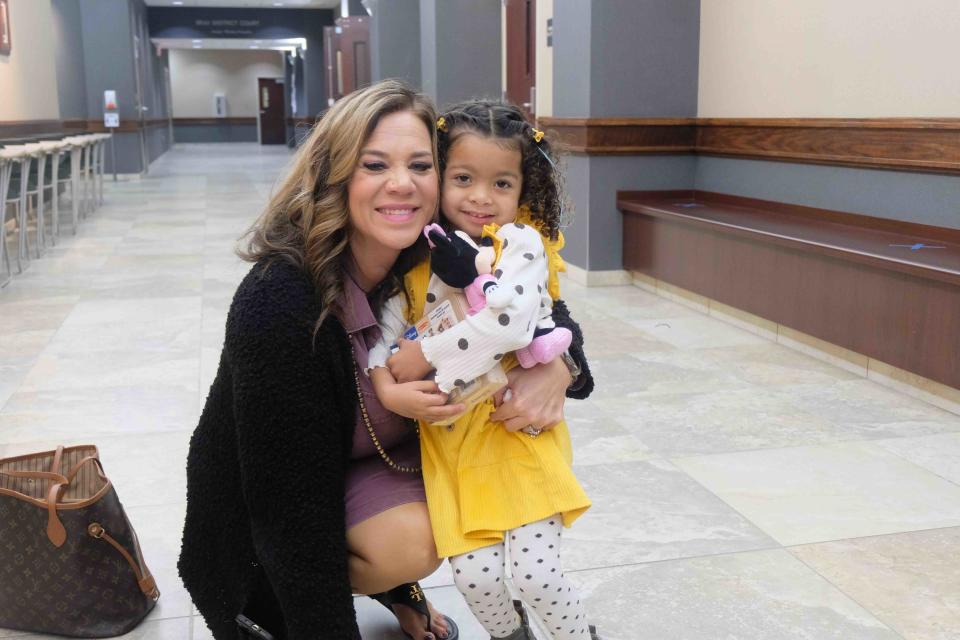 Cassidy  James embraces her newly adopted daughter Kazlynn James Nov. 17 during the National Adoption Day event at the Randall County Courthouse in Canyon.