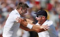 Britain Cricket - England v Pakistan - Third Test - Edgbaston - 7/8/16 England's Chris Woakes celebrates taking the wicket of Pakistan's Asad Shafiq with Stuart Broad Action Images via Reuters / Paul Childs