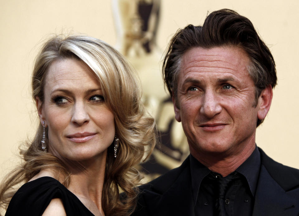 Robin Wright Penn, left, and Sean Penn arrive for the 81st Academy Awards. - Credit: ASSOCIATED PRESS