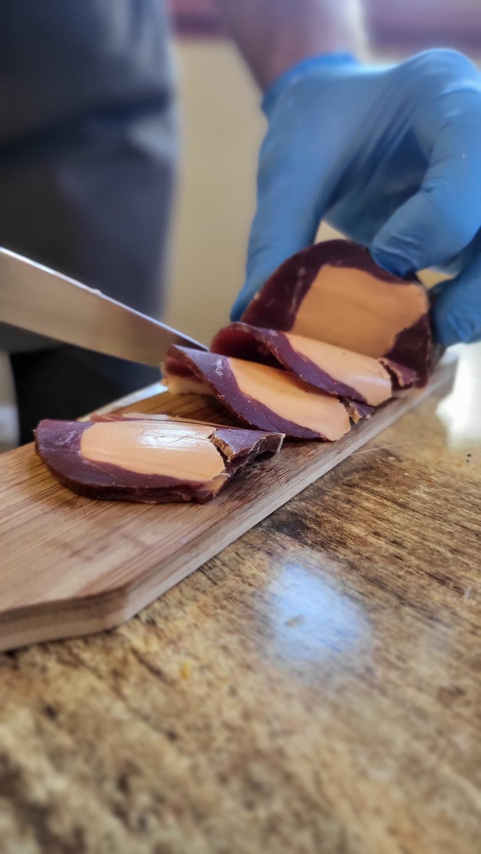 Foie wrapped in cured duck is served at at La Mère Gaud.  Courier Journal dining columnist Dana McMahan explored the food and drink of the Haute Savoie region of France on a culinary tour with Saveur the Journey in October.