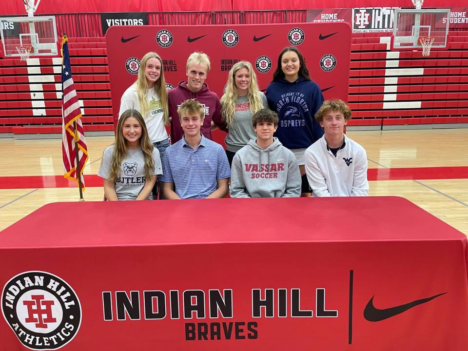 Indian Hill celebrated National Signing Day Wednesday, Nov. 8, with a formal athletic signing ceremony, including seniors, from left: front, Brooke Arington, Butler University tennis; Alex Holzapfel, Washington & Lee golf; Gavin Johnson, Vassar College soccer; Weston Jonke, West Virginia University soccer; back, Lexi Larsen, University of South Florida lacrosse; Ben Liebel, University of Chicago baseball; Madden Phelps, Denison University field hockey and Dakota Spurrier, University of North Florida volleyball.