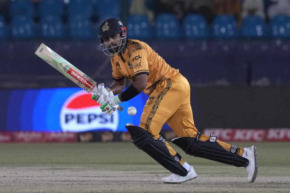 Peshawar Zalmi' Babar Azam plays a shot during the Pakistan Super League T20 cricket qualifier match between Peshawar Zalmi and Multan Sultans, in Karachi, Pakistan, Thursday, March 14, 2024. (AP Photo/Fareed Khan)