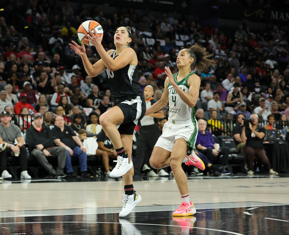 LAS VEGAS, NEVADA - SEPTEMBER 24: Kelsey Plum #10 of the Las Vegas Aces drives to the basket in front of Skylar Diggins-Smith #4 of the Seattle Storm during the third quarter of game 2 of the first round of the 2024 WNBA Playoffs at Michelob ULTRA Arena on September 24, 2024 in Las Vegas, Nevada. The Aces defeated the Storm 83-76 to win the series 2-0. NOTE TO USER: User expressly acknowledges and agrees that by downloading and/or using this photograph, user agrees to the terms of the Getty Images License Agreement. (Photo by Ethan Miller/Getty Images)