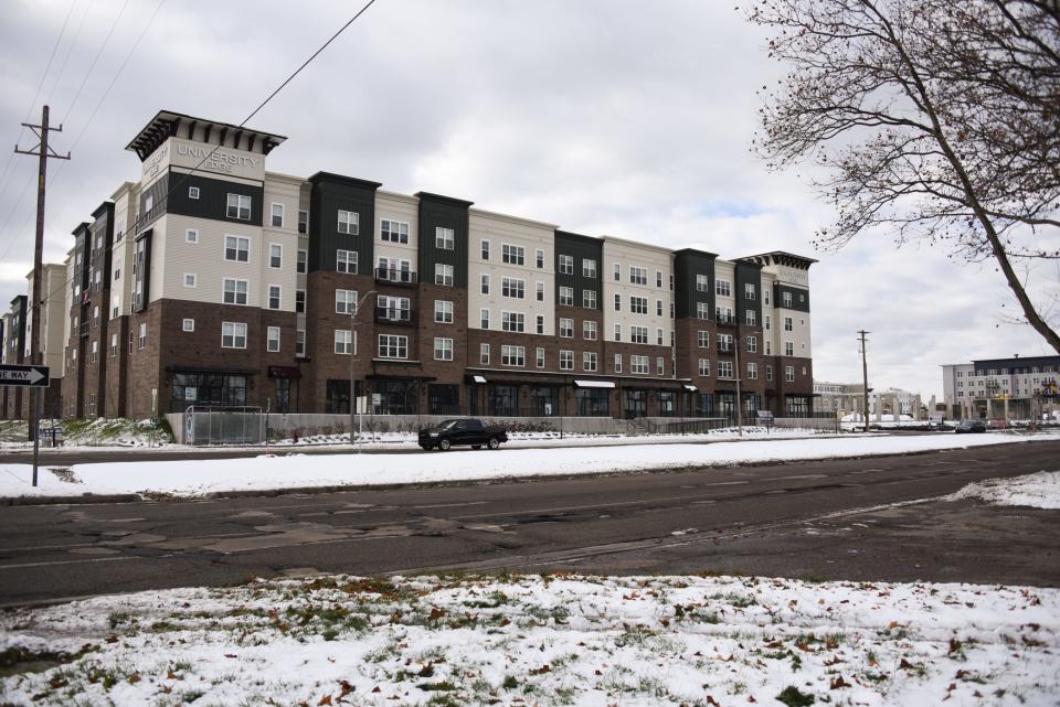 University Edge Apartments in the 3000 block of East Michigan Avenue in Lansing, pictured Monday, Nov. 19, 2021. The apartments are part of the Red Cedar Development, where Hooked, an independent bookstore/coffee shop/wine bar, will be located.