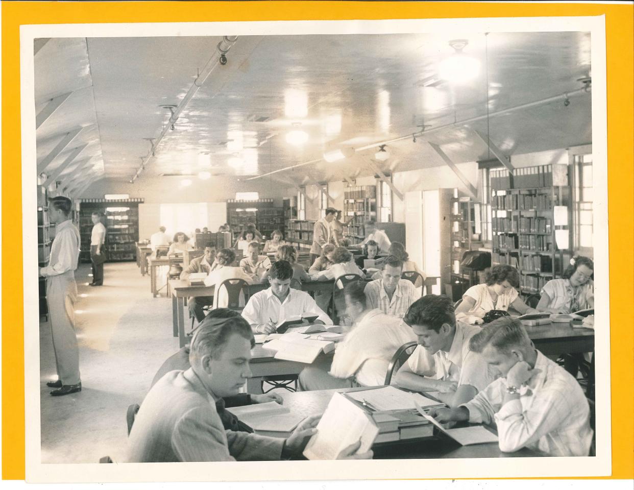Students used an airplane hangar as a library after Palm Beach Junior College moved into Morrison Field, a deactivated Army-Air Force base, in the late 1940s.