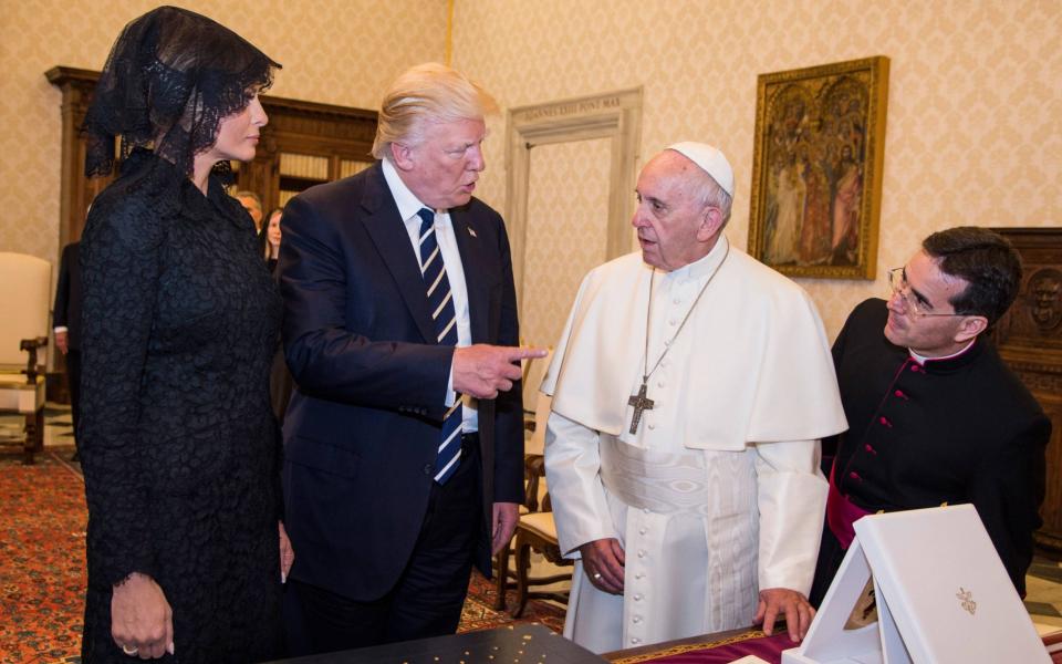 Pope Francis seen receiving Donald Trump - Credit: Barcroft Media