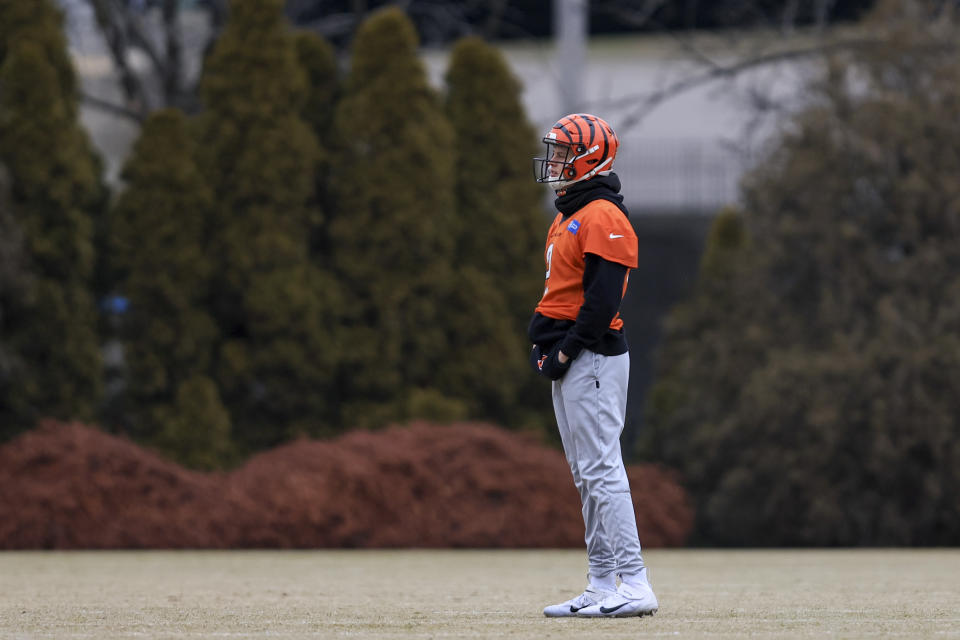 Cincinnati Bengals quarterback Joe Burrow stands on the field during an NFL football practice in Cincinnati, Thursday, Jan. 26, 2023. The Bengals are scheduled to play the Kansas City Chiefs Sunday in the AFC championship game. (AP Photo/Aaron Doster)