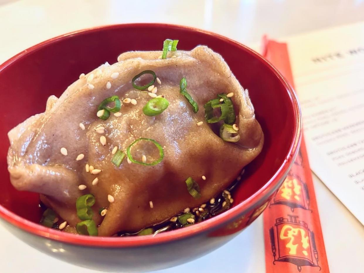 The "yamazaki" egg, or giant dumpling, at the Nite Wolf, 234 E. Vine St., is reason enough to stop into Uncle Wolfie's new nighttime ramen concept.