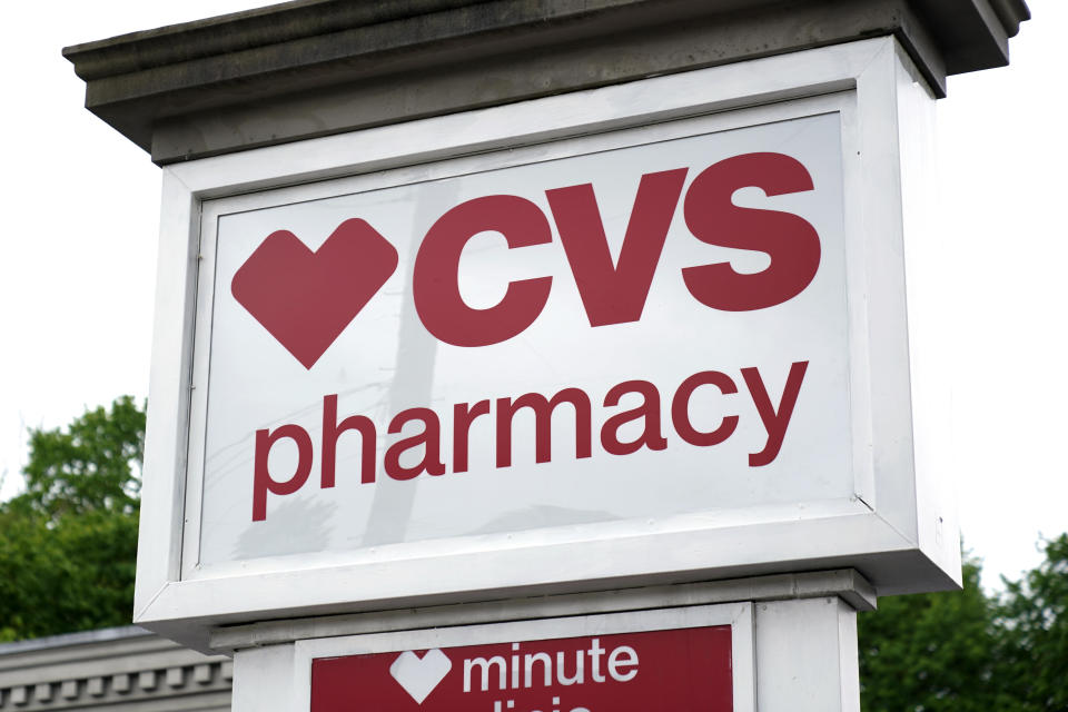 A CVS Pharmacy sign stands in Mount Lebanon, Pa., on Monday May 3, 2021. / Credit: Gene J. Puskar / AP