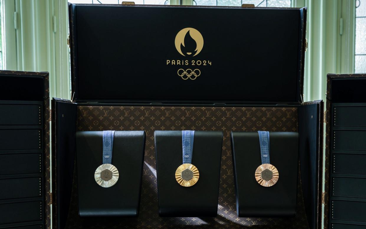 An open trunk displays the medals of the Paris 2024 Olympic Games