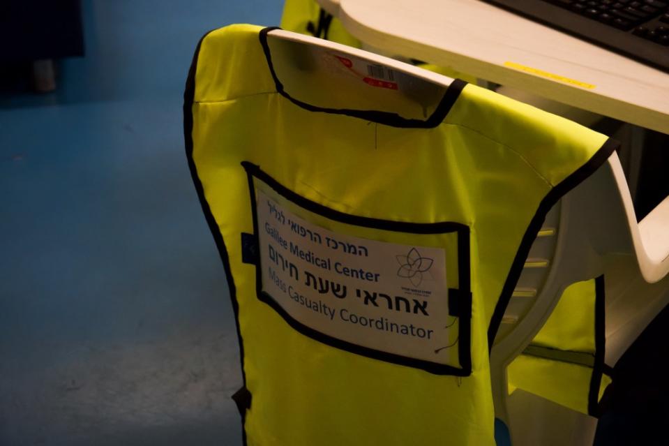 A reflective vest for the Galilee Medical Center’s mass casualty coordinator is draped over a chair. (Photo by Charlotte Lawson)