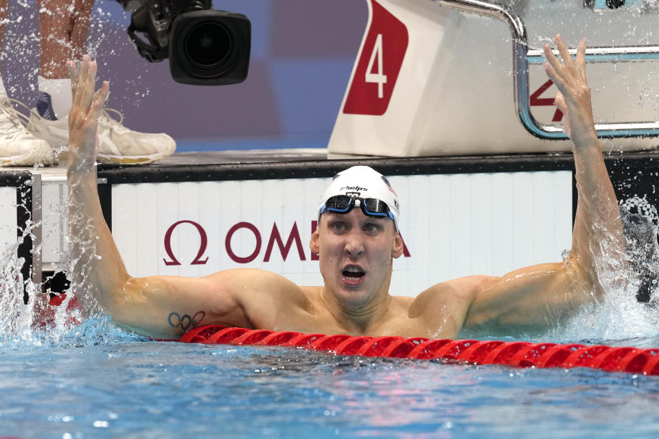 Chase Kalisz, of the United States, celebrates after winning the final of the men's 400-meter individual medley at the 2020 Summer Olympics, Sunday, July 25, 2021, in Tokyo, Japan. (AP Photo/Martin Meissner)