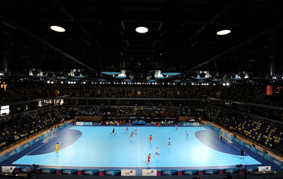 Players from China and Slovakia compete in a preliminary match in the Olympic test event series London Handball Cup in London November 23, 2011. REUTERS/Paul Hackett