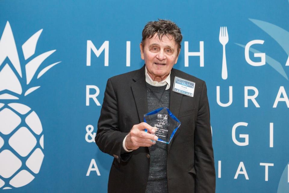 Frank Marro of Marro's Italian Restaurant of Saugatuck receives an annual award from the MRLA.