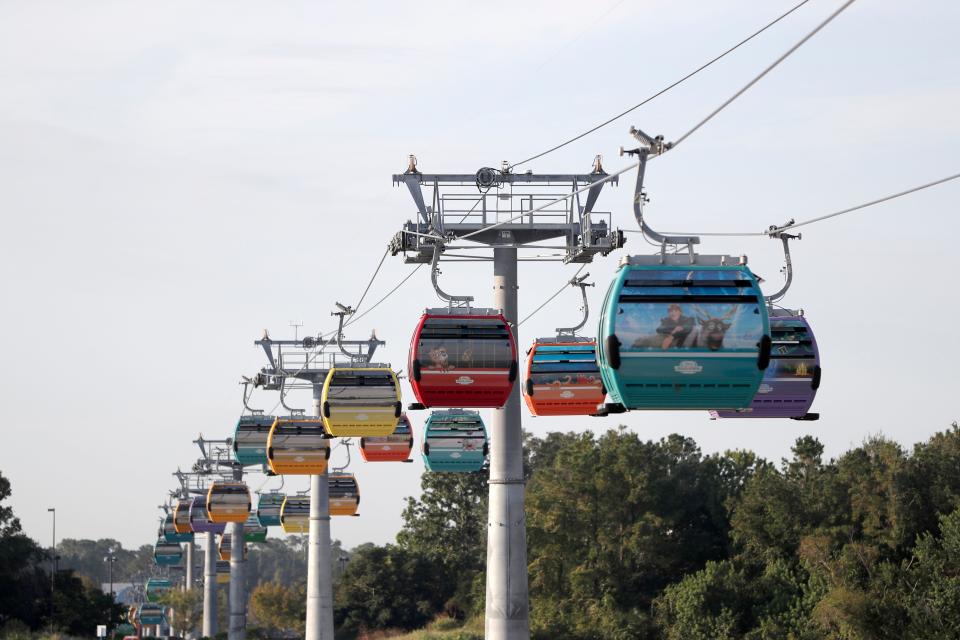 Disney World's Skyliner aerial trams begin operating Sunday.