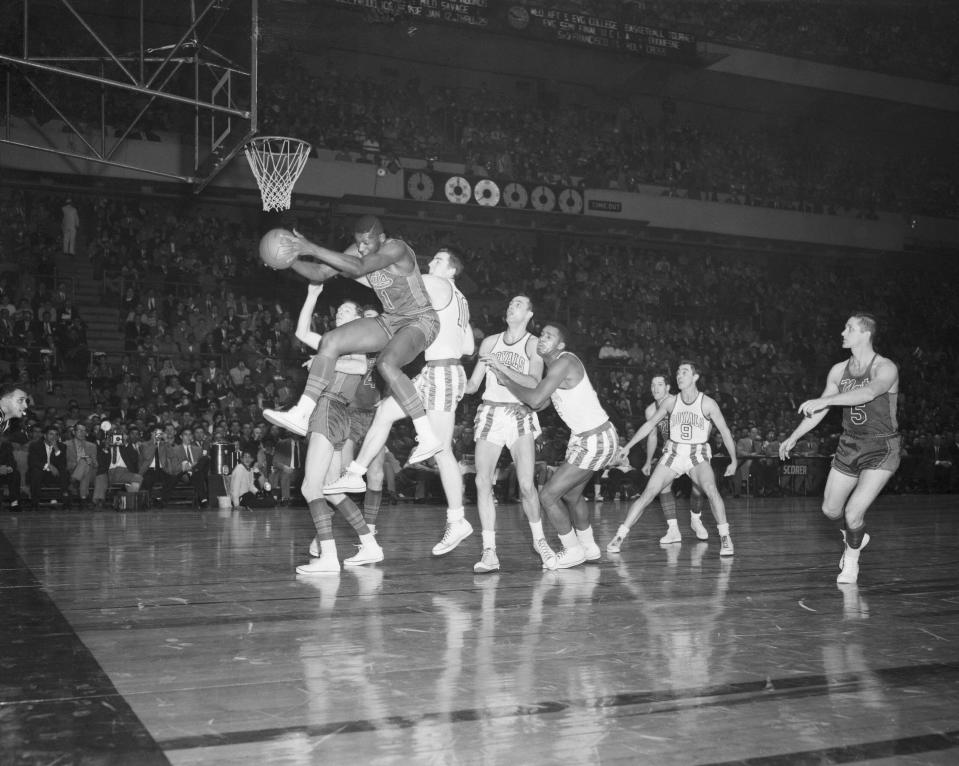 Earl Lloyd grabs a rebound during a game in 1955. (Bettmann Archives/Getty Images)