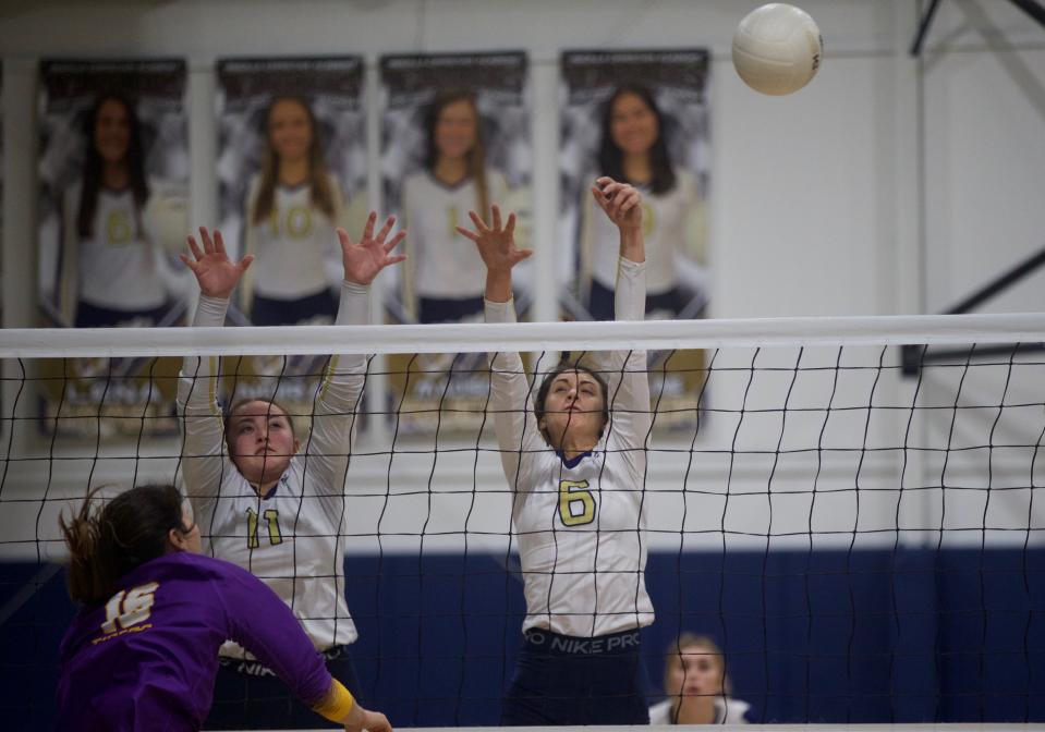 Aucilla Christian sophomore Kiley Donaldson (11) and senior Lena Kimmell (6) attempt to block a shot in a game against Union County on Nov. 1, 2022, at Aucilla Christian. The Warriors lost 3-0.