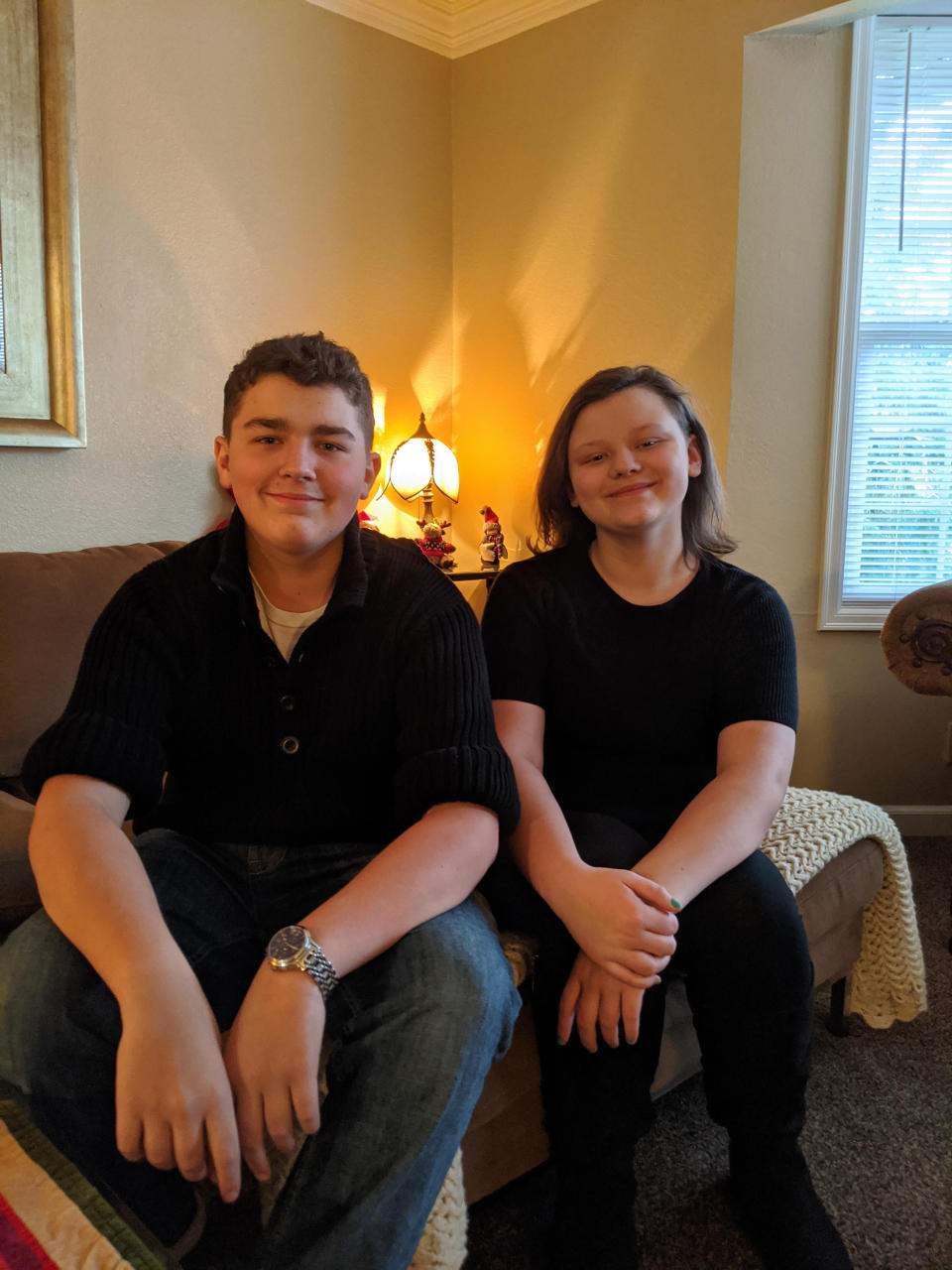 Anthony Lawson, 13, sits with his sister, Teddi, 12, for a photo at the end of 2019. (Theresa Lawson)