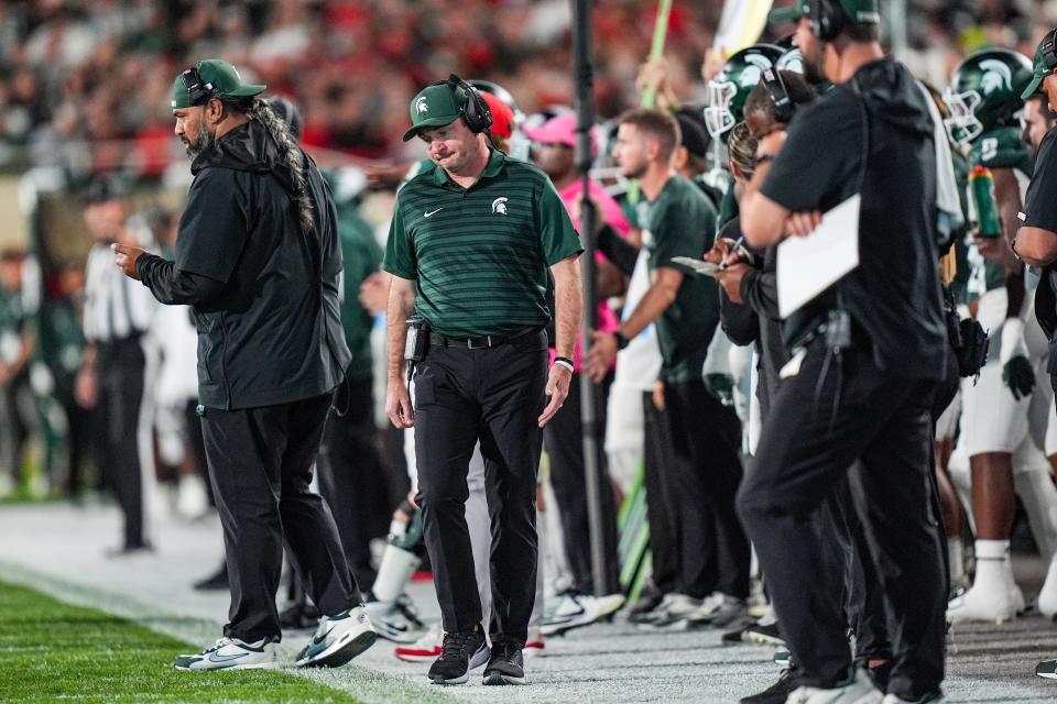 Michigan State Spartans head coach Jonathan Smith walks the sidelines during the fourth quarter the NCAA football game against Ohio State University at Spartan Stadium in East Lansing, Saturday, Sept. 28, 2024. Buckeyes won 38-7.