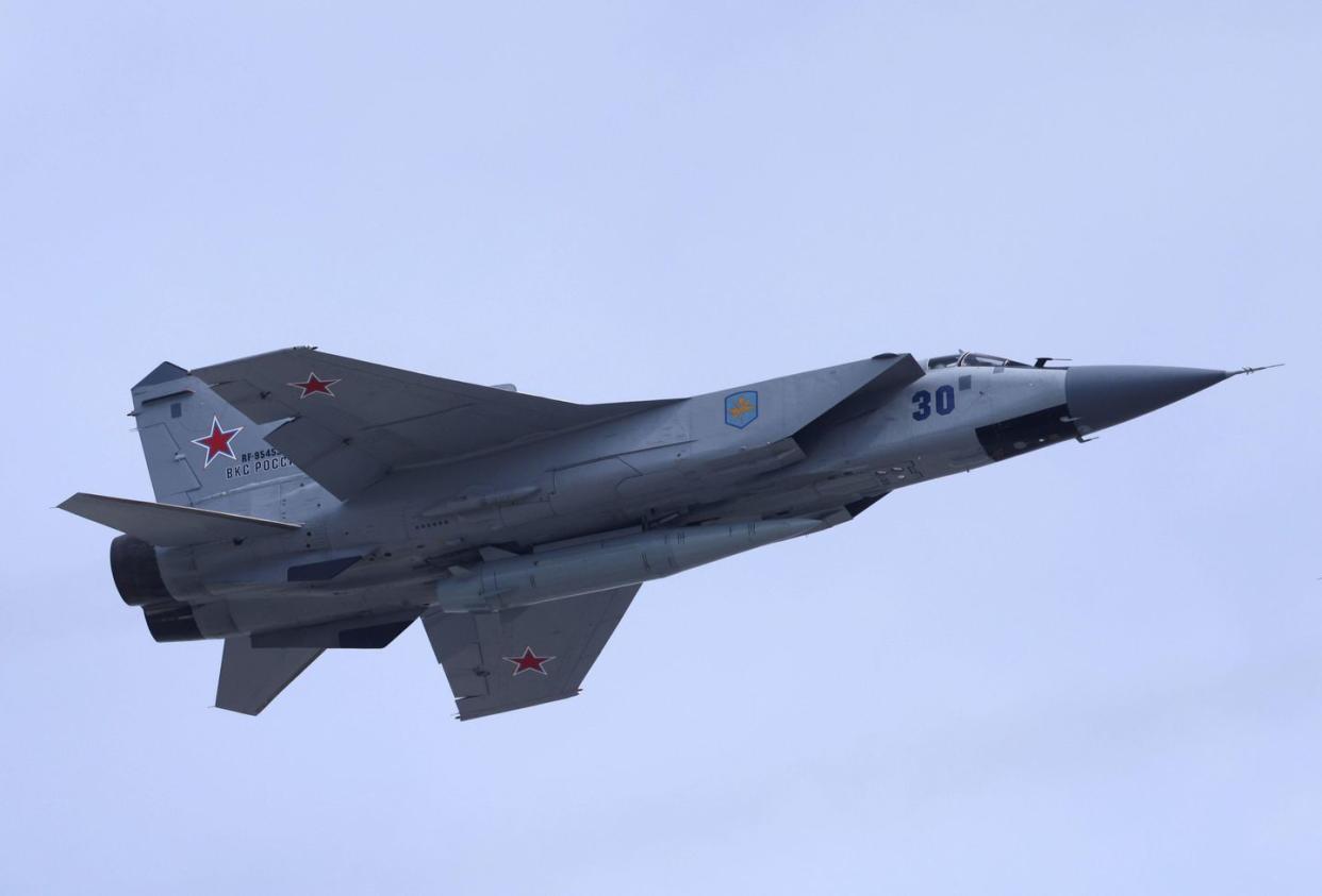 2j78rey a russian mig 31 fighter jet equipped with a kinzhal hypersonic missile flies over red square during a rehearsal for a flypast, part of a military parade marking the anniversary of the victory over nazi germany in world war two, in central moscow, russia may 7, 2022 reutersmaxim shemetov