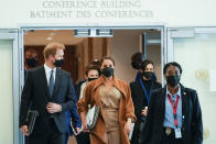 Prince Harry and Meghan, the Duke and Duchess of Sussex are escorted as they leave the United Nations headquarters after a visit during 76th session of the United Nations General Assembly, Saturday, Sept. 25, 2021. (AP Photo/Mary Altaffer)