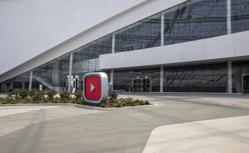 Inglewood, CA - July 23- A giant play button is oouside of the new YouTube Theater, a 6,000 seat performance venue that is part of a larger complex called Hollywood Park on Friday, July 23, 2021 in Inglewood, CA. (Brian van der Brug / Los Angeles Times)