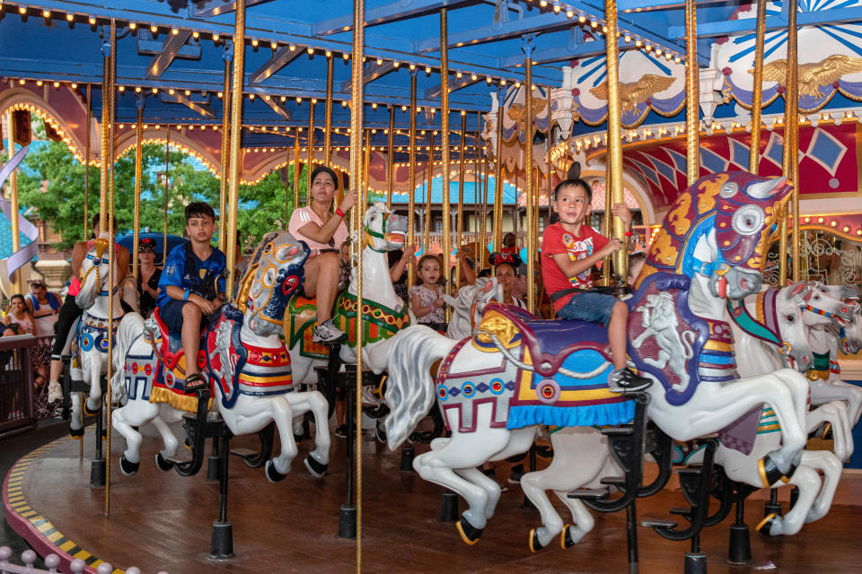 One of the major reasons why this attraction is last is because it's a standard merry-go-round, which can be found in most major cities across the world — but just because it's a typical merry-go-round doesn't mean this one is like the rest. There's actually a lot of history behind this attraction. 