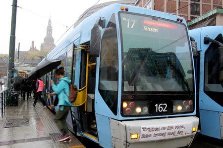 Commuters travel by tram in central Oslo, Norway, April 24, 2017. REUTERS/Alister Doyle